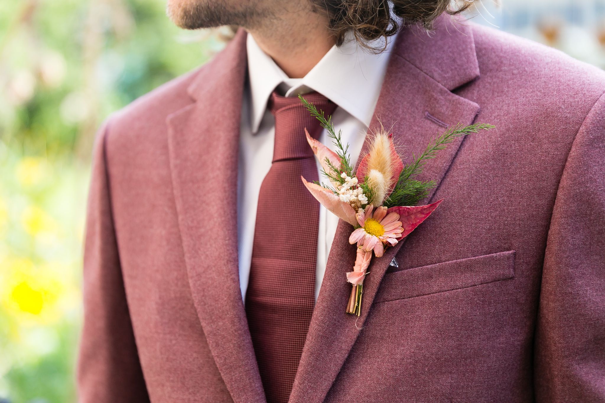 Who wears buttonholes at a wedding? Laurenne Hopkins Flowers